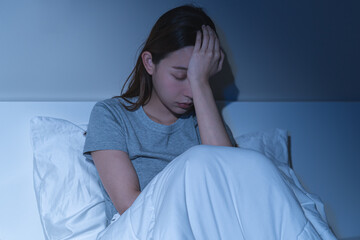 Sad worried and stressed, depressed asian young woman, girl suffering in bed from insomnia problem,...