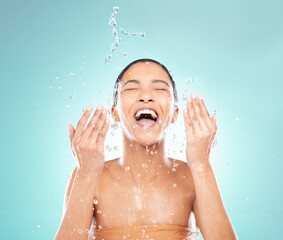 Skincare, water and woman washing face in studio for wellness, hygiene and skin health isolated on...