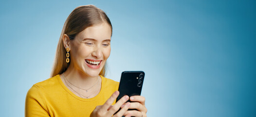 Funny, woman and phone text in studio with social media, smile and meme with mockup for banner....