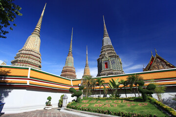 Fototapeta premium Wat Phra Chetuphon Wimon Mangkhalaram Rajwaramahaviharn or Wat Pho the famous attractions in Bangkok, Thailand 