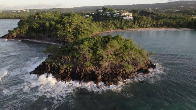 Tropical island off coast of Playa Las Ballenas in Samana Dominican Republic