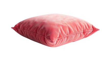 A soft pink pillow on a white background, perfect for home decor or bedding. The puffed-up cushion looks inviting and comfortable.