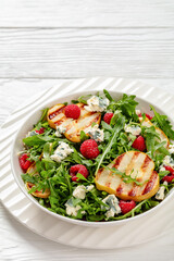 grilled pear salad with cheese, arugula, berries