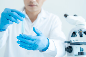 Scientist analyze biochemical sample in advanced scientific laboratory. Medical professional check...