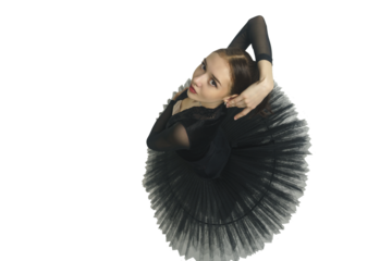 portrait of a young ballerina in a black tutu dancing with her hands moving top view, immersion in dance, isolated on transparent background, png