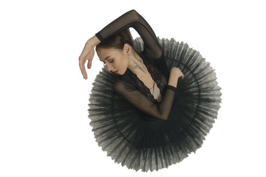 portrait of a young ballerina in a black tutu dancing with her hands moving top view, immersion in dance, isolated on transparent background, png