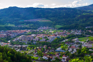 Aerial view of a small Austrian town at the foot of the Alps