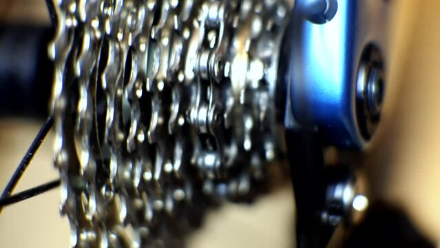 Electronic shifting rotates chain on bicycle drivetrain	