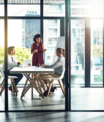 Business meeting, leadership and woman in office with whiteboard presentation for data analytics, training and review. Teamwork, coaching and girl speaker with group for workshop, ideas or feedback