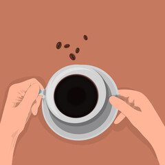 hand holding a coffee cup on a brown table