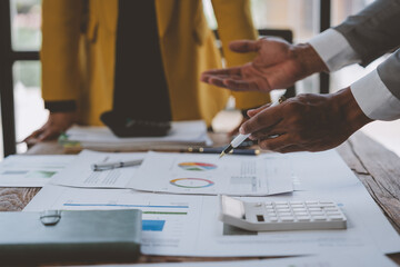 Strategy meeting in the office Professional businessman and office worker working in team meeting...