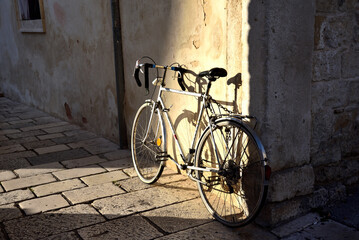Bicycle leaning against the wall