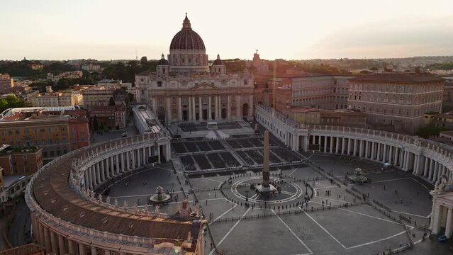 Aerial view of the dwarf Vatican City state in Rome, Italy. Drone view of St. Peter's Square in Vatican City at sunset