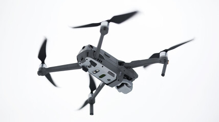 Drone against the sky. Copter in flight.