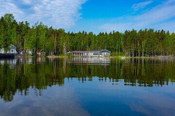 House on the lake in the middle of the forest
