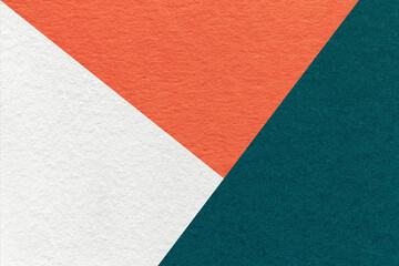 Texture of craft white, orange and emerald shade color paper background, macro. Vintage abstract...