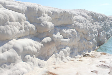 White limestone wall Pamukkale Travertines turkish famous thermal water bath