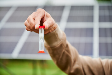 Time working for green energy investments. Solar batteries generating energy that generating...