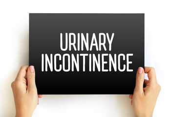 Urinary incontinence - leaking of urine that you can't control, text concept on card