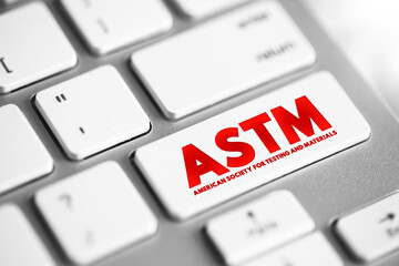 ASTM - American Society for Testing and Materials is an international standards organization, text concept button on keyboard