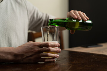 Pouring Beer into Glass - Refreshing Drink at Home
