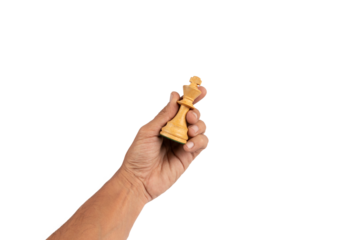 Black male hand holding wood king chess figure isolated no background