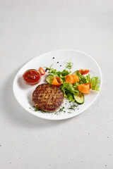 Juicy beef steak with a side of fresh vegetable salad, perfect for healthy menus and food blogs
