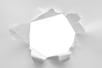 Torn ripped paper hole isolated on white background