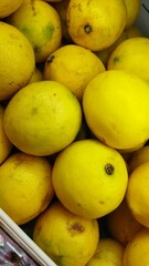 Buying lemon fruit on supermarket