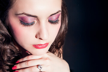 Cosmetics Ideas and Concepts. Closeup of Young Winsome Caucasian Brunette Female Face with Long Dark Eyelashes