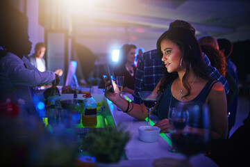 Woman, smartphone and texting in club for party, event or nightlife, bonding and message for...