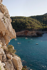 Ibiza landscape, Port de Sant Miquel bay view with boats. Balearic Islands, Spain.