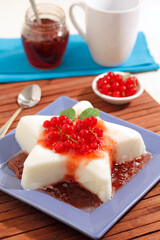 Panna cotta with red currants.