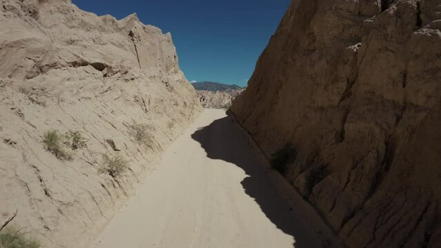 FPV drone flying through a canyon in the "Quebrada de las Flechas" in Salta, northeastern Argentina.