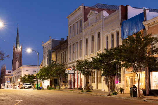 Natchez, Mississippi, USA - April 21, 2024: Twilight light descends on a quiet downtown Natchez landscape.