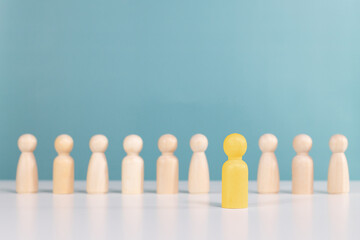 Human resources management, recruitment business, promotion at work,employee dismissal,team leader appointment. Leader standing in front of team out from the crowd