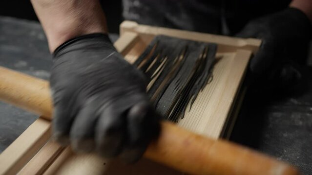 Making Spaghetti At Black Ink Squid On Guitar Instrument Frame