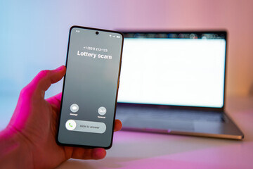 Lottery Scam call concept on mobile phone. Person get scam call alert. Phone call from unknown...