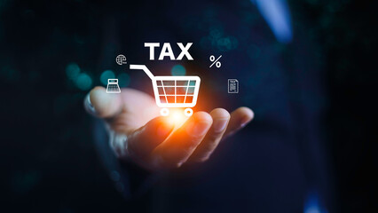 Tax increase concept. tax icon in hand. Pay online income tax. income tax system icon around. futuristic virtual screen interface technology..