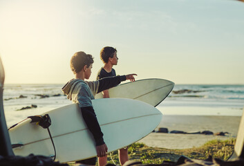 Kid, learning and surf on beach with board for adventure on vacation, holiday or sport in water....