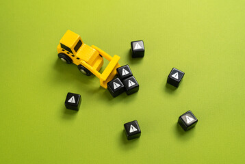 A bulldozer removes scattered CO2 blocks. Reducing environmental pollution with greenhouse gases....