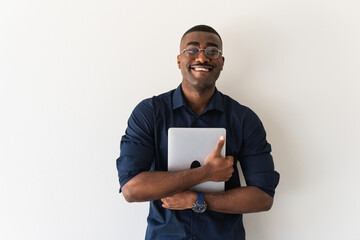 Happy african american student holding laptop on isolated white background