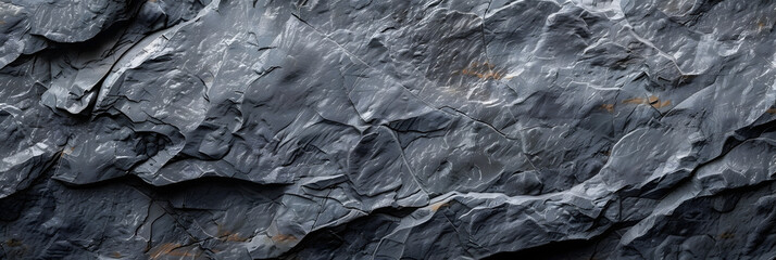 Copy space image of a gray stone with an embossed surface showcasing a textured granite pattern