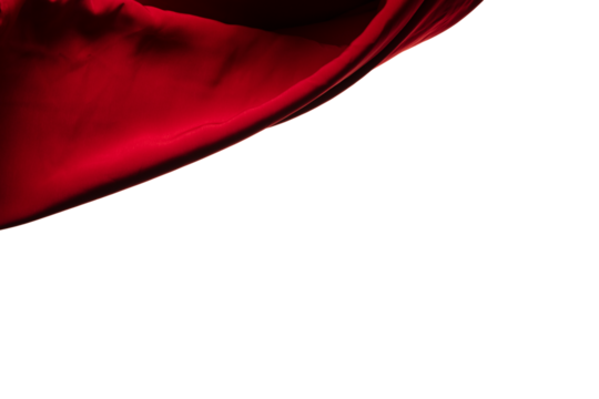 Red curtain fabric flying in curve shape, Piece of textile red curtain fabric throw fall in air. White background isolated, dark shading environment