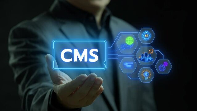 CMS, Content management system concept for business website management. Businessman showing glowing neon line of content management system icons on virtual screen.