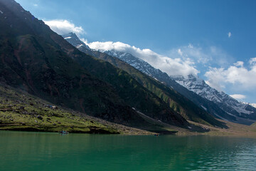 Majestic Mountains Embrace Attabad Lake in Hunza's Serene Embrace