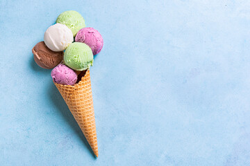 Ice cream cone with various scoops