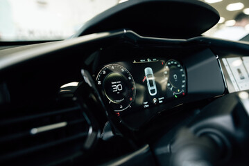 Close up shot of a speedometer in a car. Car dashboard with details