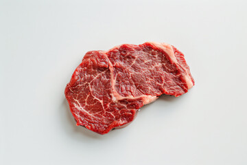 Fototapeta premium a piece of steak on a white surface