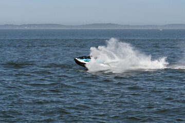 jet ski at high speed on a body of water